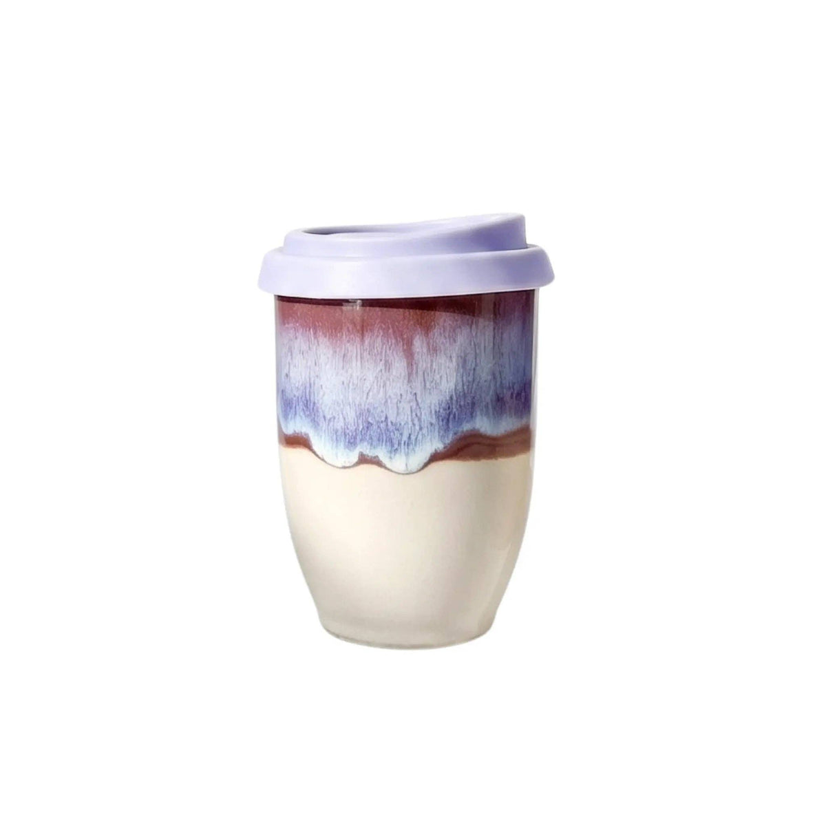 A ceramic travel tumbler with a light purple lid, featuring a cream-colored lower half and a marbled top section with purple, blue, and reddish-brown drips.