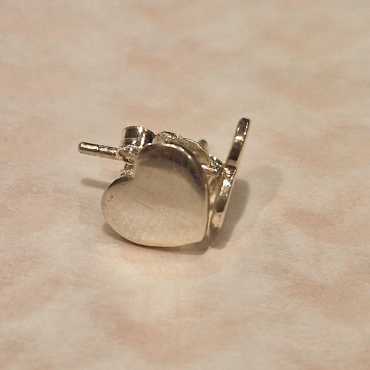 silver heart shapes stud earrings